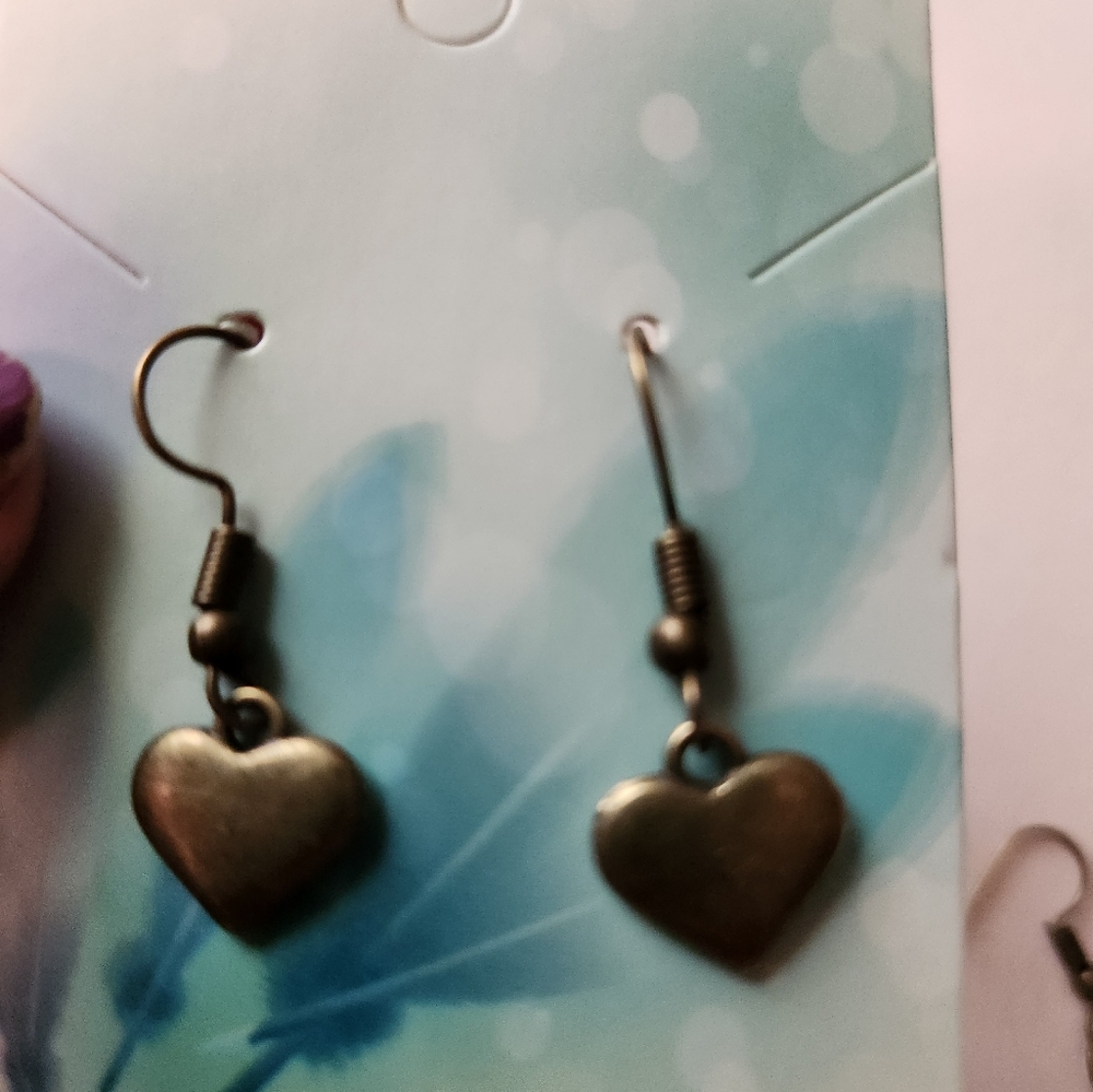 Bronze tone heart shaped earrings.